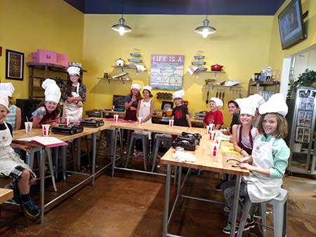 Kids learn to cook at Cinnamons cafe in Albuquerque